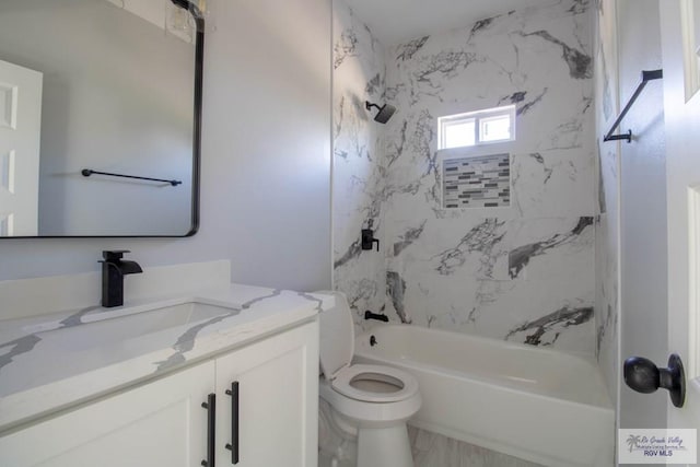 full bath with bathtub / shower combination, vanity, and toilet