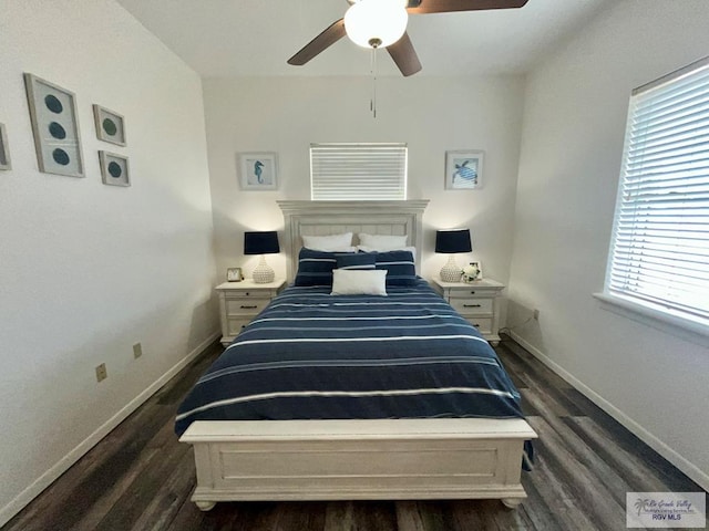 6410 Padre Blvd Unit 108, South Padre Island, TX 78597 - bedroom featuring wood finished floors, baseboards, and ceiling fan