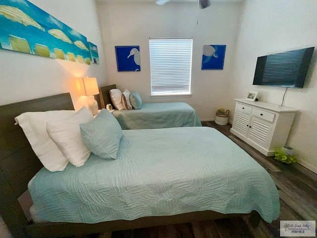 6410 Padre Blvd Unit 108, South Padre Island, TX 78597 - bedroom featuring wood finished floors and baseboards