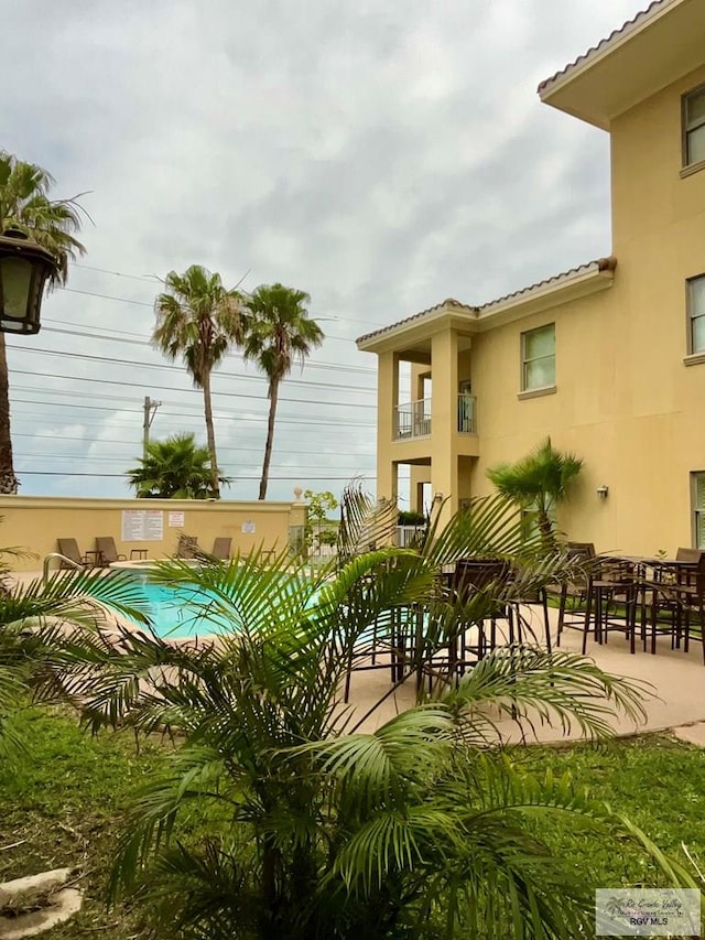 view of pool featuring a patio area