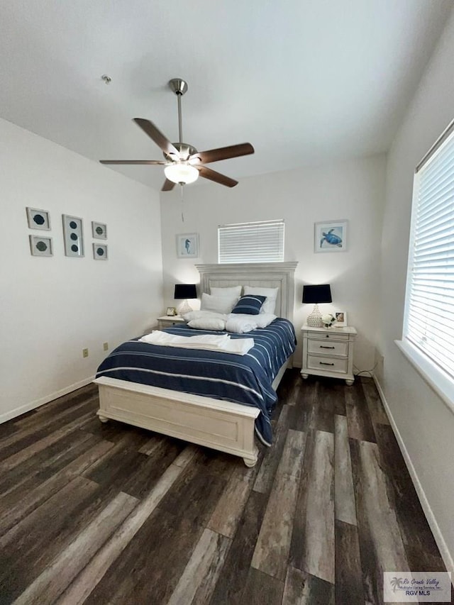 bedroom with baseboards, a ceiling fan, and wood finished floors