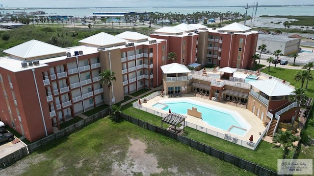 birds eye view of property with a water view