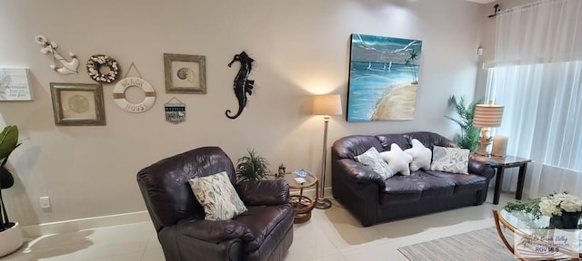 living area featuring light tile patterned floors