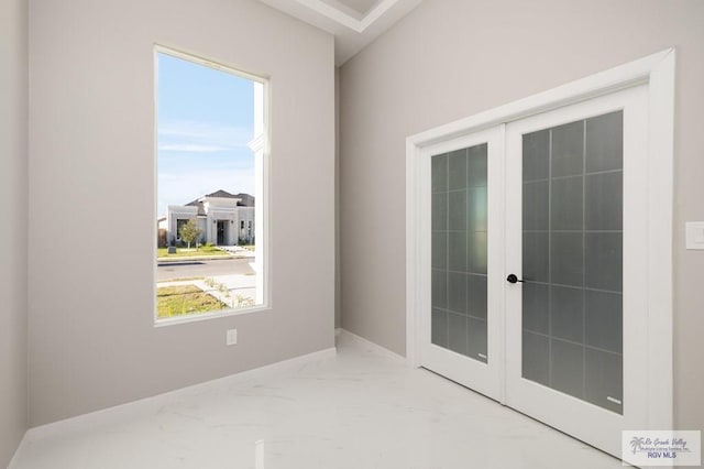 1202 Moses Dr, San Juan, TX 78589 - unfurnished room with a wealth of natural light and marble finish floor