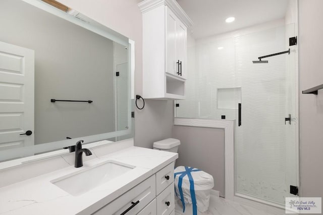 1202 Moses Dr, San Juan, TX 78589 - bathroom featuring vanity, marble finish floor, toilet, recessed lighting, and a stall shower