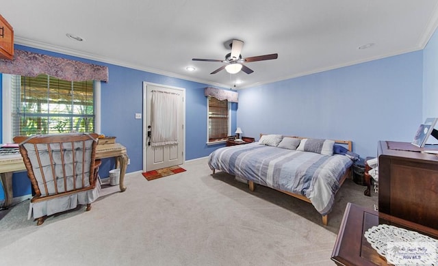 bedroom featuring light carpet, ceiling fan, and crown molding