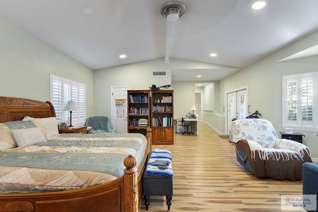 bedroom with french doors, light wood-type flooring, ceiling fan, a closet, and lofted ceiling