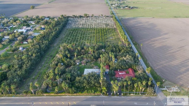 birds eye view of property featuring a rural view