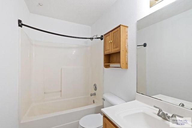 full bathroom featuring shower / tub combination, vanity, and toilet