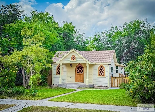 1214 W Lincoln Ave Unit 22, Harlingen, TX 78550 - view of front of property with a shingled roof