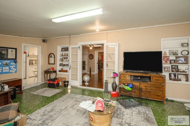 living room with ornamental molding