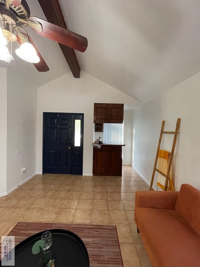 entryway featuring lofted ceiling with beams and light tile patterned flooring