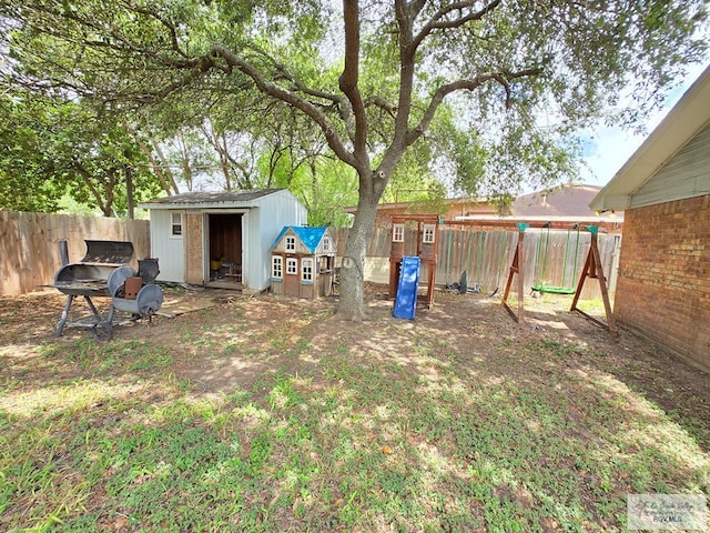 4727 Las Palomas St, Brownsville, TX 78521 - fenced backyard with a storage shed