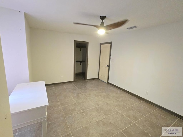 4727 Las Palomas St, Brownsville, TX 78521 - spare room featuring a ceiling fan and light tile patterned flooring
