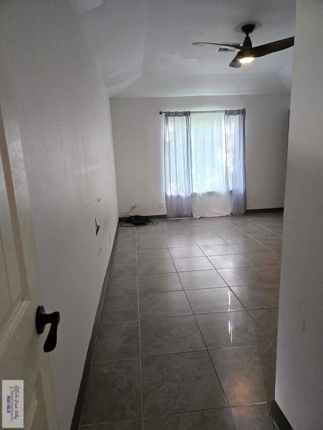 4727 Las Palomas St, Brownsville, TX 78521 - spare room featuring ceiling fan and tile patterned flooring
