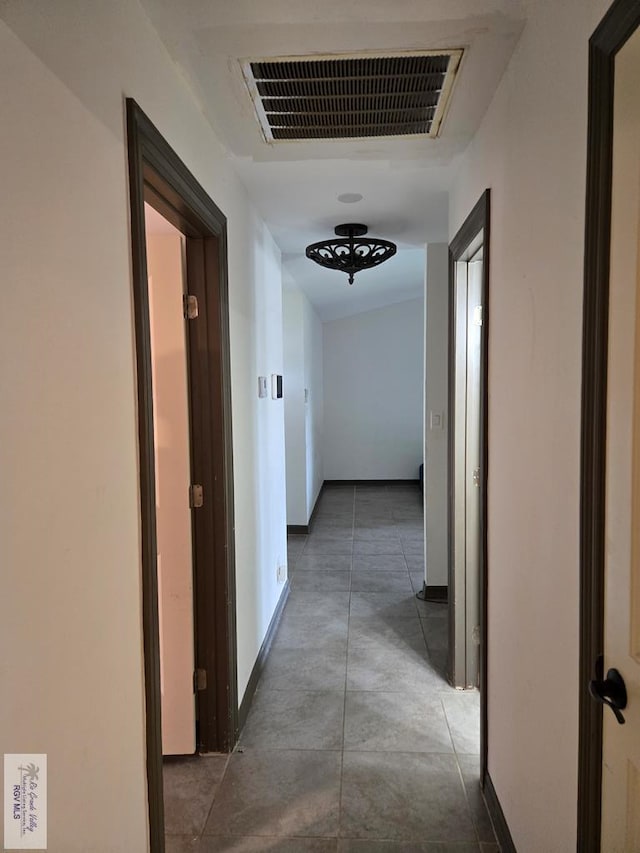 4727 Las Palomas St, Brownsville, TX 78521 - hallway with baseboards and concrete flooring