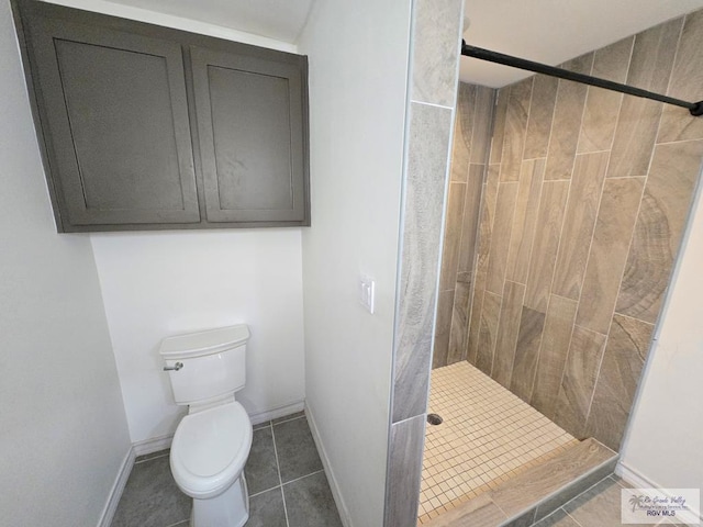 4727 Las Palomas St, Brownsville, TX 78521 - bathroom with a shower stall and tile patterned flooring