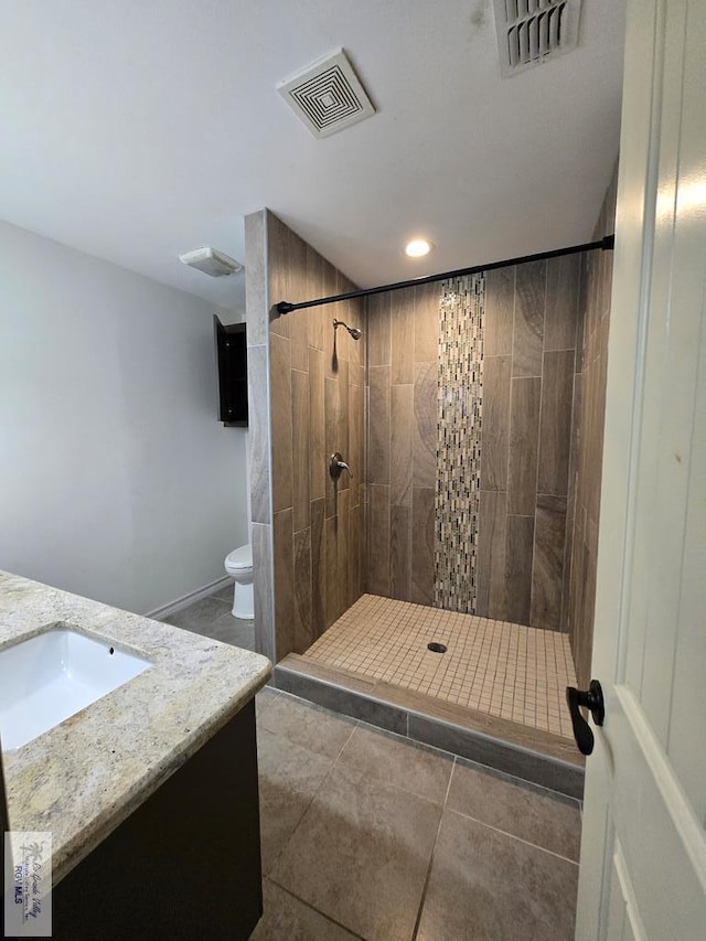 4727 Las Palomas St, Brownsville, TX 78521 - full bath with vanity, a tile shower, tile patterned flooring, and recessed lighting