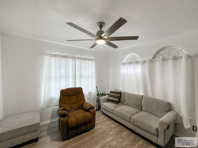 700 N Illinois Ave, Weslaco, TX 78596 - living room with ceiling fan and light wood finished floors