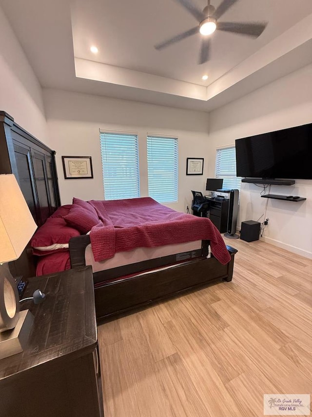 1992 Lulu St, Brownsville, TX 78577 - bedroom with a raised ceiling, wood finished floors, baseboards, recessed lighting, and ceiling fan