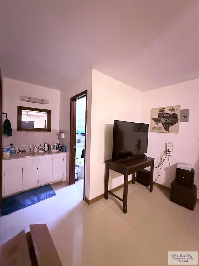 living area featuring light tile patterned floors