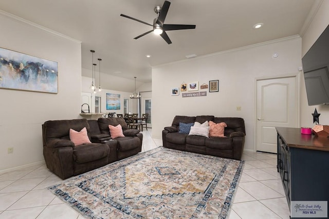 living room with crown molding, light tile patterned floors, and ceiling fan