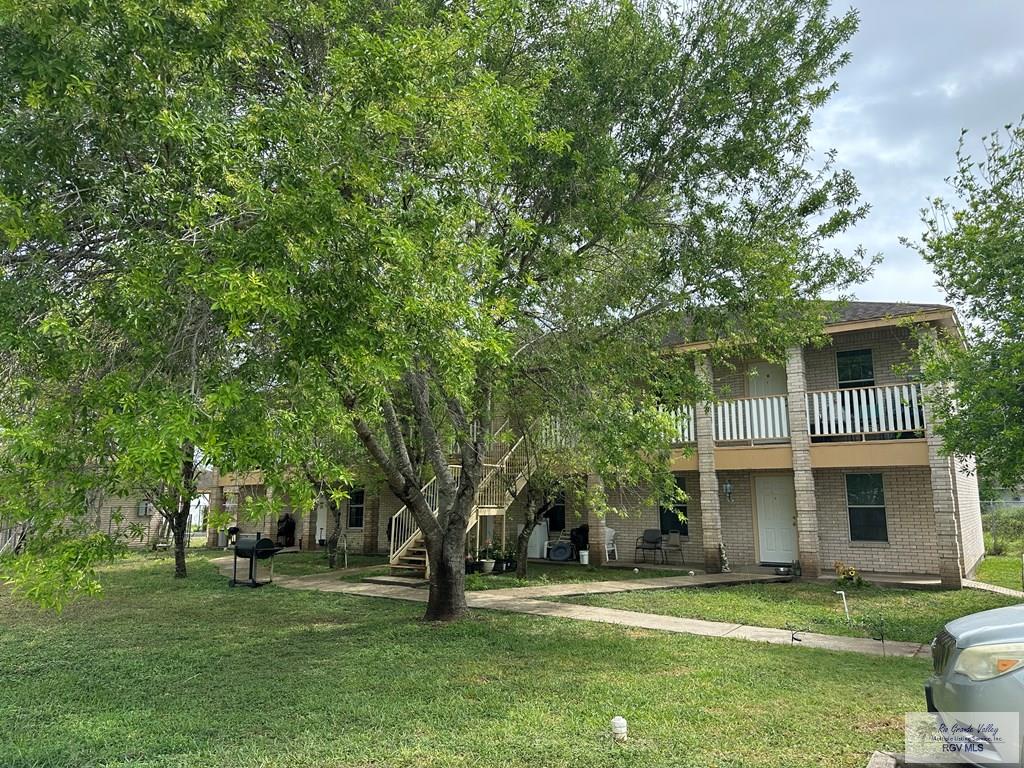 4810 Boca Chica Blvd, Brownsville, TX 78520 - exterior space with a lawn