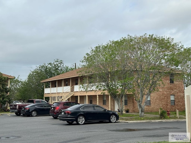 4810 Boca Chica Blvd, Brownsville, TX 78520 - view of front of house featuring brick siding and uncovered parking