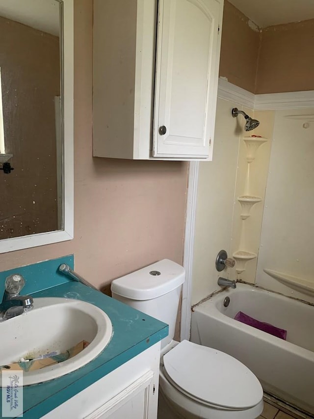 full bathroom featuring vanity, shower / bathing tub combination, and toilet