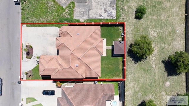 2410 E 21st St, Mission, TX 78572 - aerial view of property and surrounding area with property boundaries highlighted