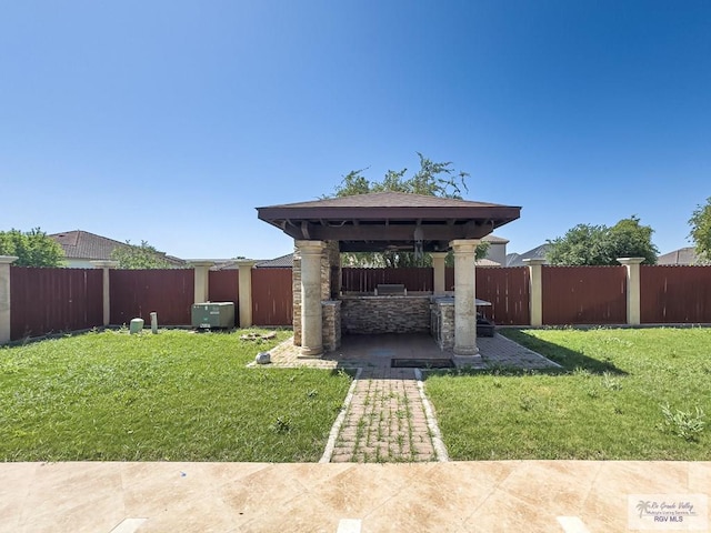 2410 E 21st St, Mission, TX 78572 - view of yard with a gazebo, exterior kitchen, and a patio