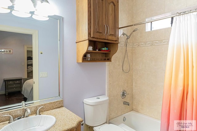 2410 E 21st St, Mission, TX 78572 - full bathroom with shower / bath combo with shower curtain, vanity, and toilet