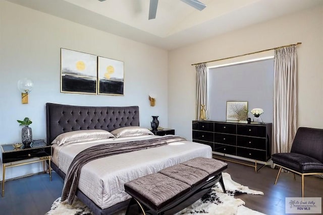 2410 E 21st St, Mission, TX 78572 - bedroom featuring wood finished floors, a ceiling fan, and vaulted ceiling