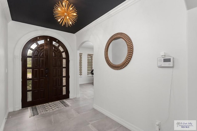 entryway with crown molding