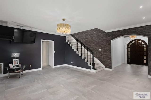 interior space featuring a notable chandelier and ornamental molding