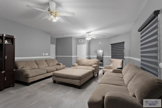 living room featuring ceiling fan