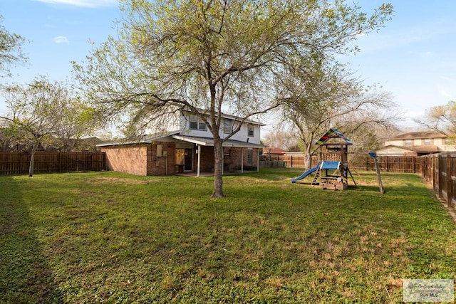 view of yard featuring a playground