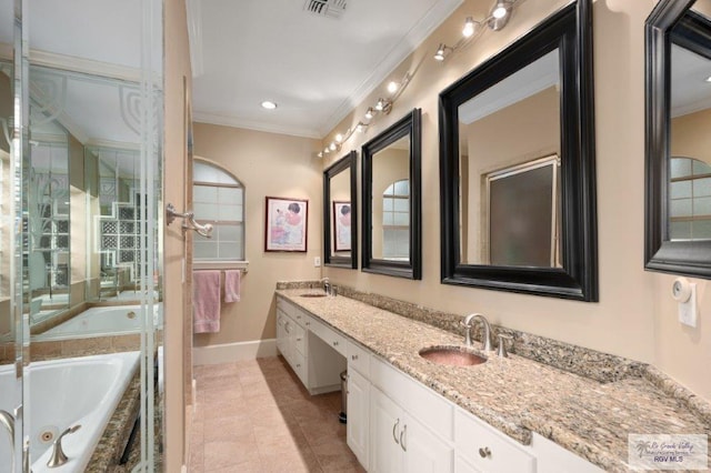 bathroom featuring a relaxing tiled tub, ornamental molding, tile patterned flooring, and vanity