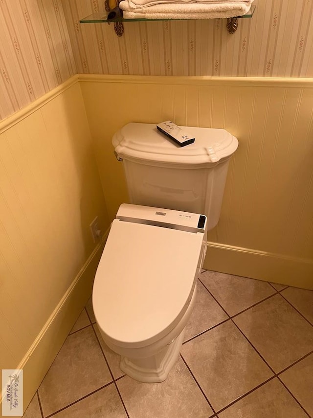 bathroom with tile patterned flooring