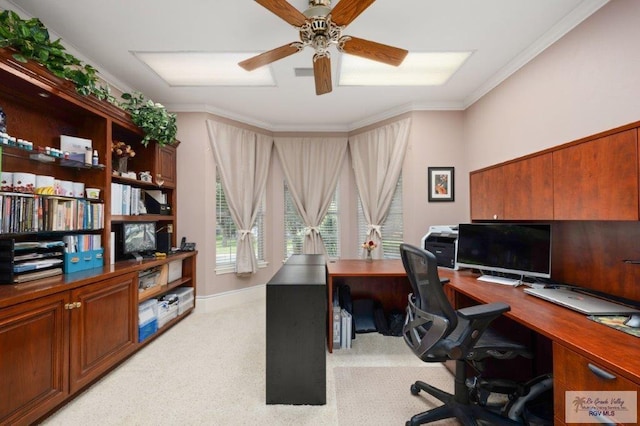 office with light carpet, crown molding, and ceiling fan