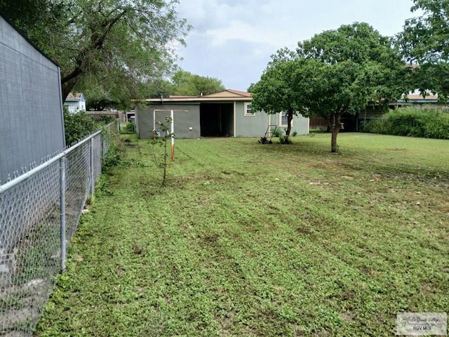 view of yard with fence