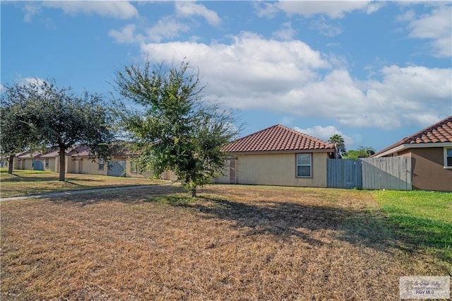 view of yard with fence