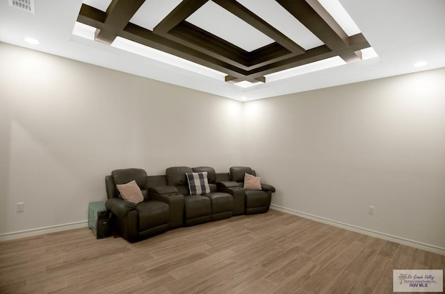 25142 Teal Cir, San Benito, TX 78586 - home theater room with recessed lighting, coffered ceiling, visible vents, beamed ceiling, and light wood-type flooring