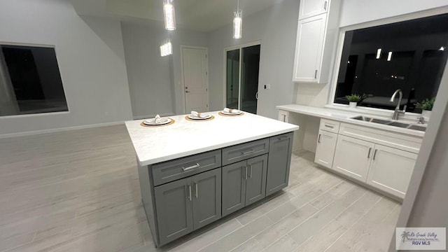 bathroom with sink and hardwood / wood-style flooring