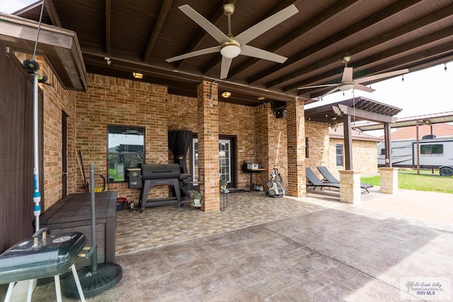 view of patio / terrace with a grill and ceiling fan