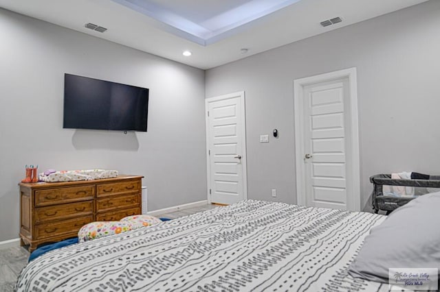 bedroom with recessed lighting, visible vents, and baseboards