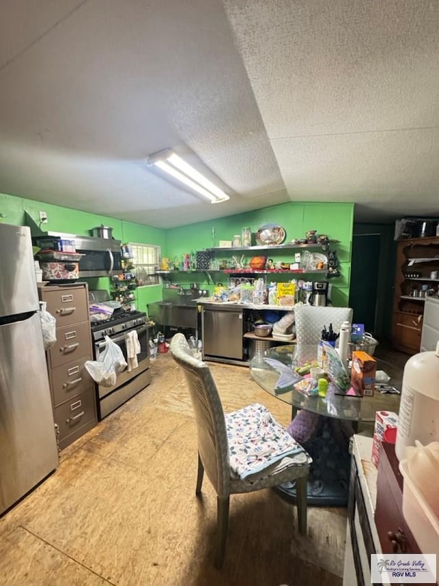 38639 Centerline Rd, Los Fresnos, TX 78566 - dining space featuring vaulted ceiling and a textured ceiling