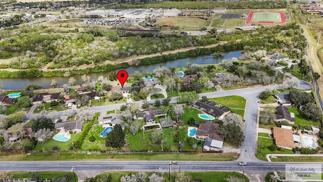 drone / aerial view with a water view