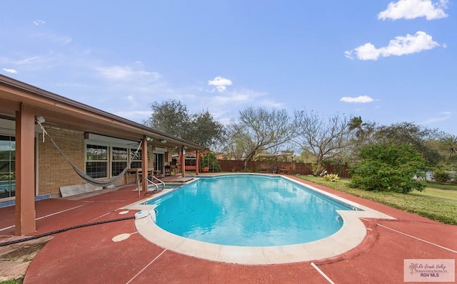 view of pool with a fenced backyard, a fenced in pool, and a patio