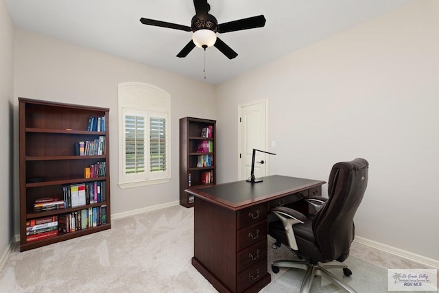 home office with light colored carpet and ceiling fan